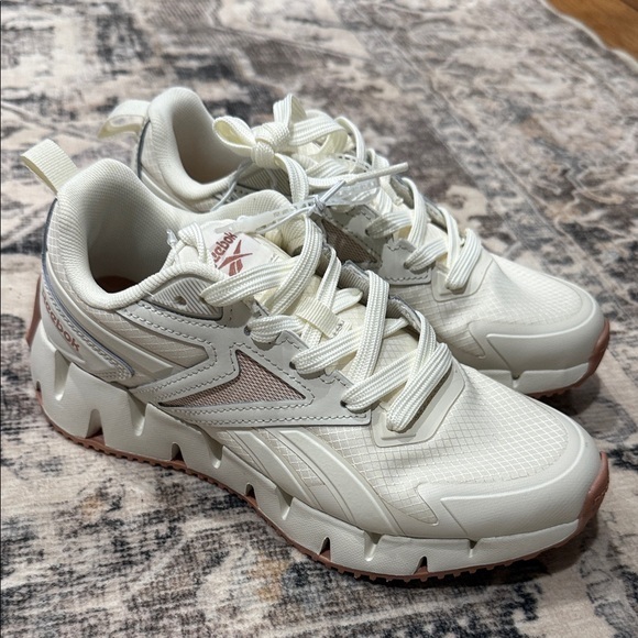 Reebok Shoes - Reebok Women's Cream and Pink Sneakers